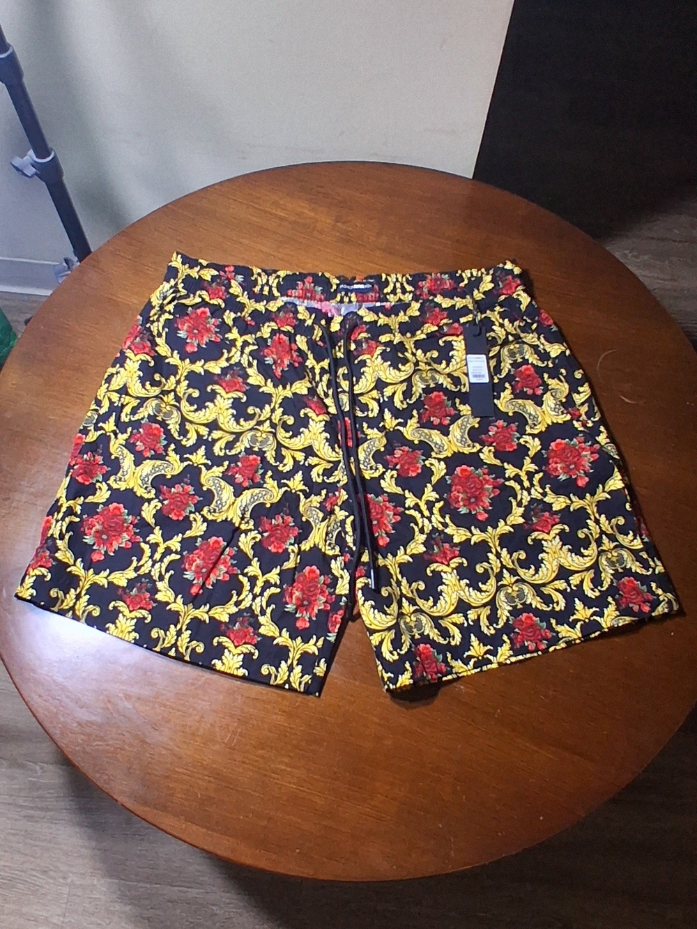 Fashion Nova Black Swim Shorts with Yellow Baroque and Red Floral Print